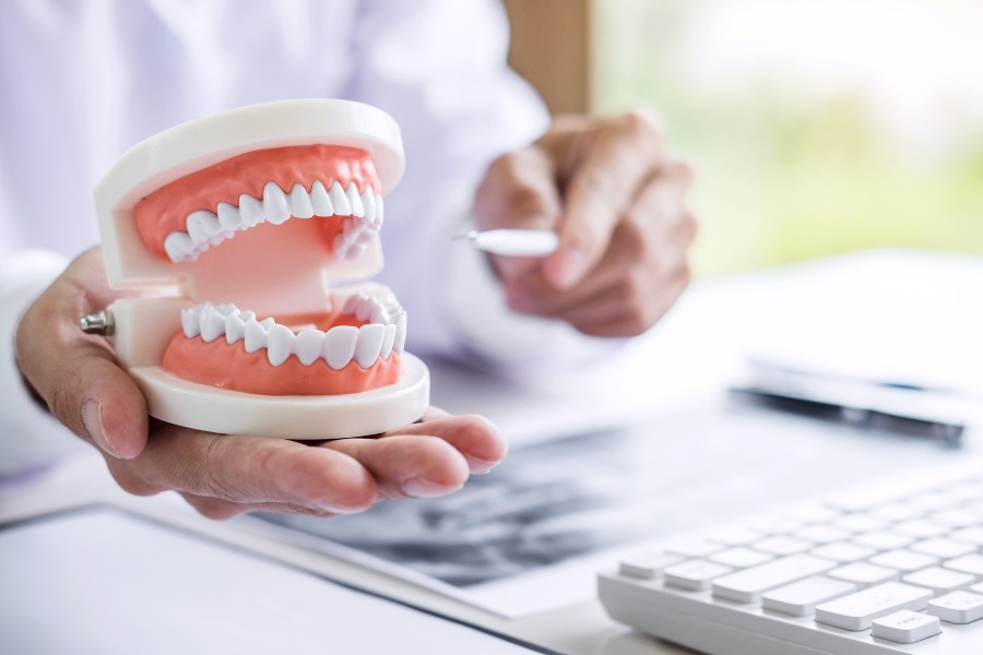 Discover Your Confident Smile with Our Denture and Dental Implant Services